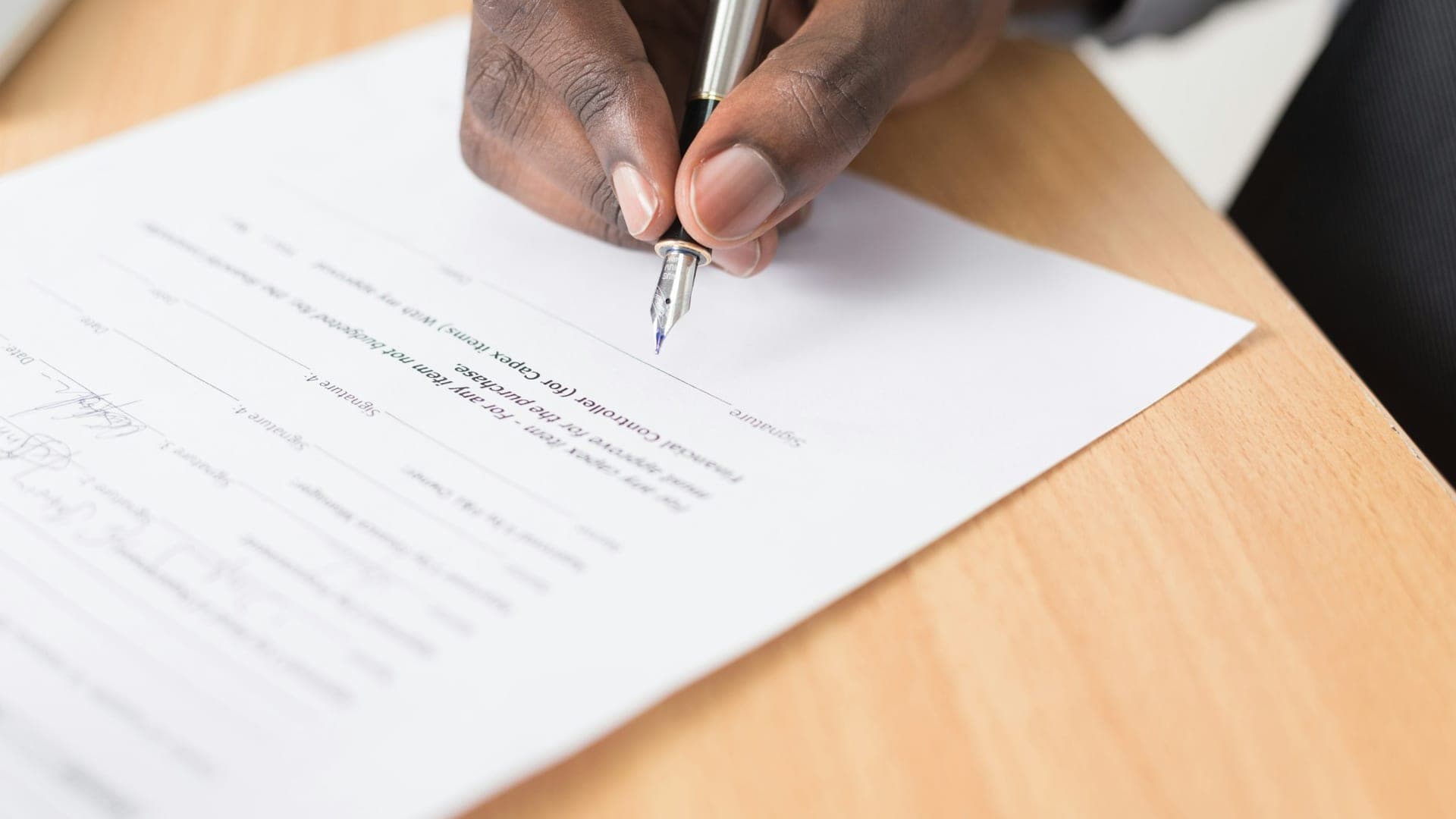 Seasonal lease agreement on a kitchen table in a mountain rental