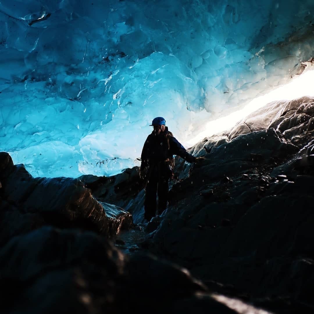 Founder exploring an ice cave