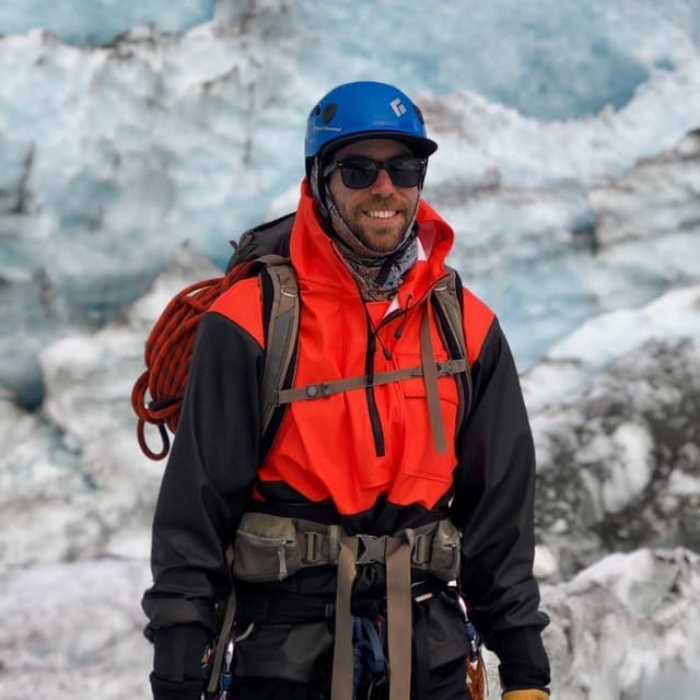 Justin Pelkowski, founder of TurnSeasons, guiding on a glacier in Juneau, Alaska